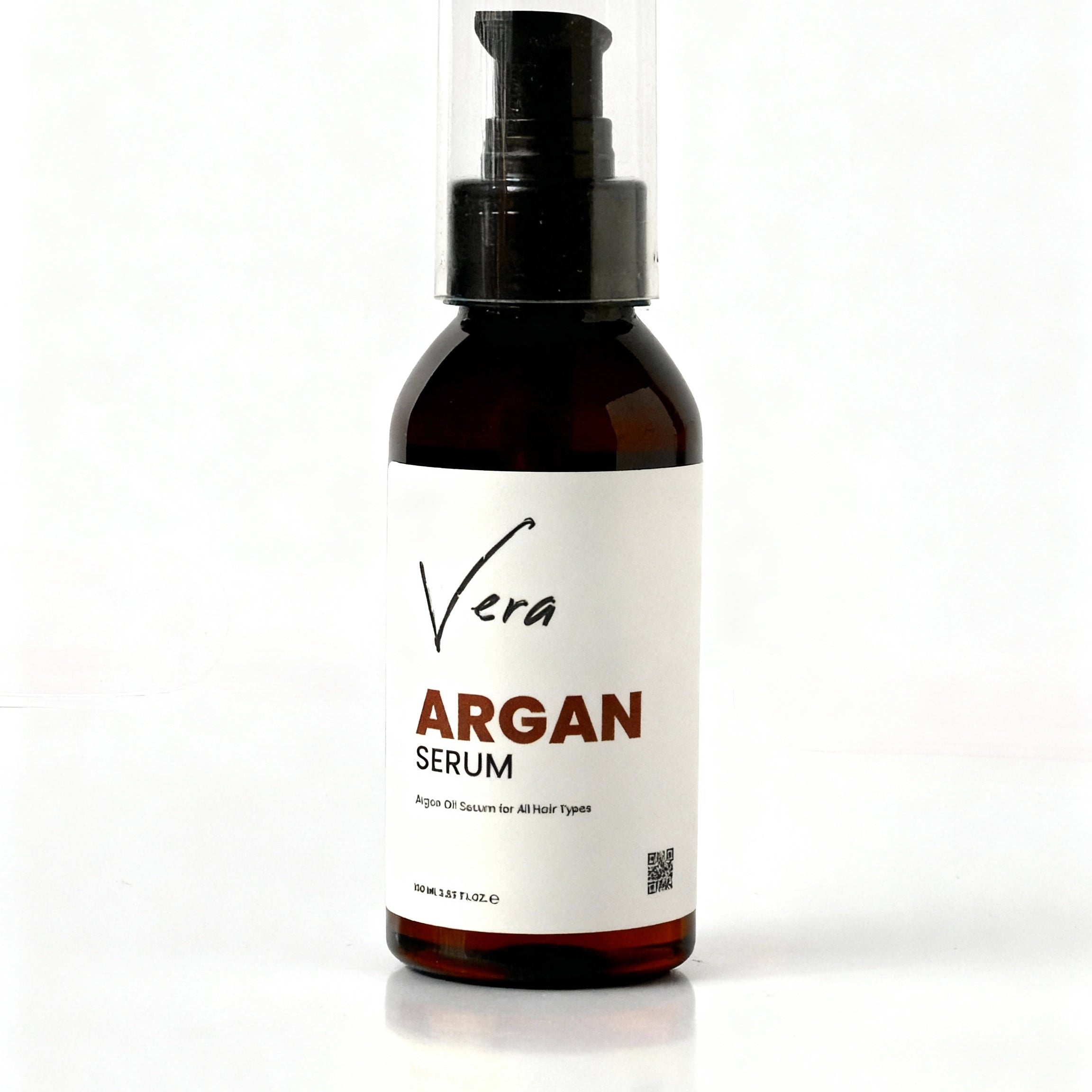 Argan_hair_serum_Use_the_uploaded_photo_of_the_Vera_ARGAN_SERUM_bottle_as_the_base_image_and_use_my_white-background_Rosemary_Serum_photo_as_a_style_reference_only.__1._Keep_the_produ.jpg